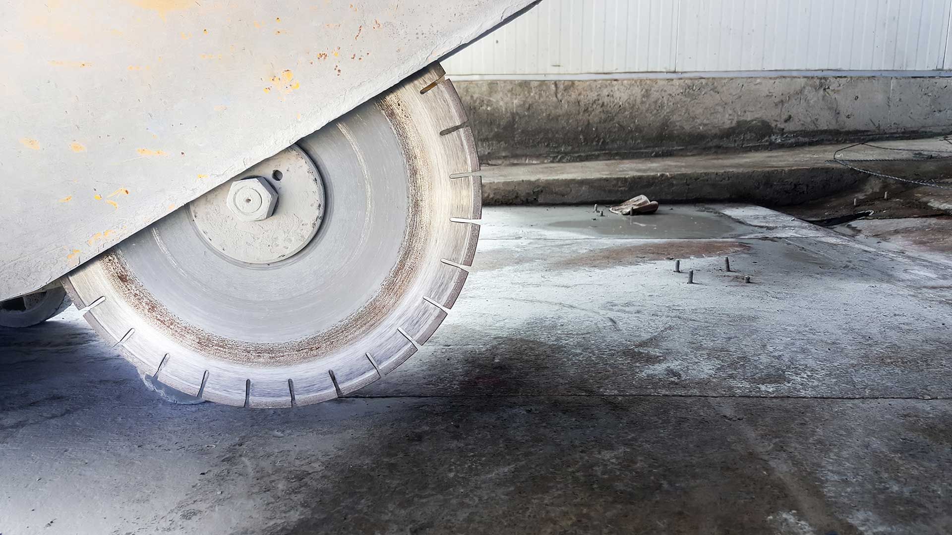 Wheel saw cutting concrete